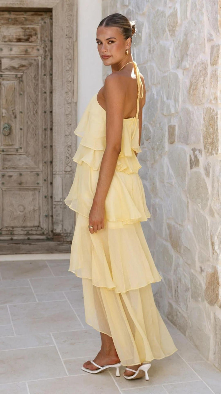 Abito femminile lungo floreale, perfetto per l'estate, con eleganti spalle scoperte.