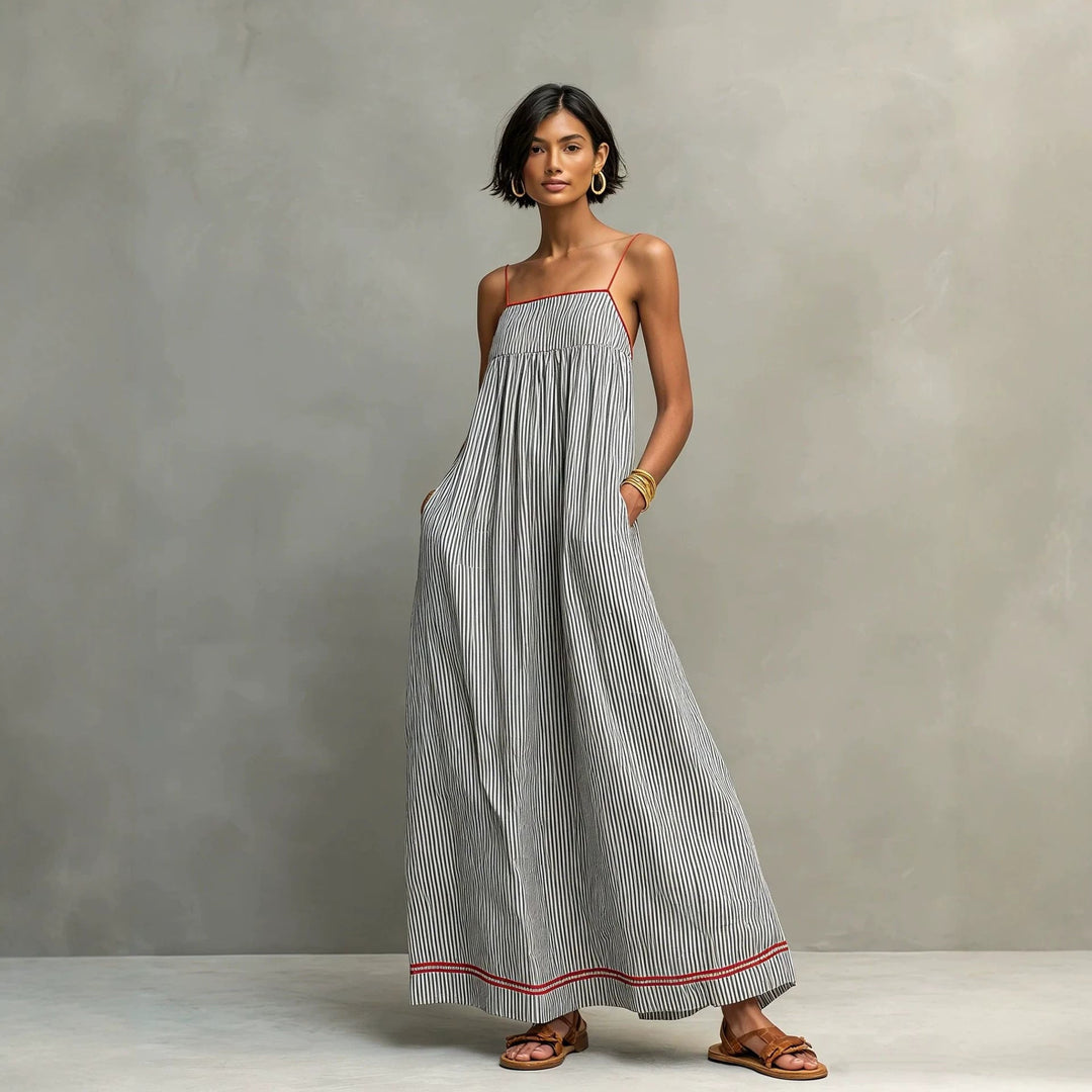 Elegante abito donna maxi senza spalline, vita alta che valorizza la figura, perfetto per le serate estive.
