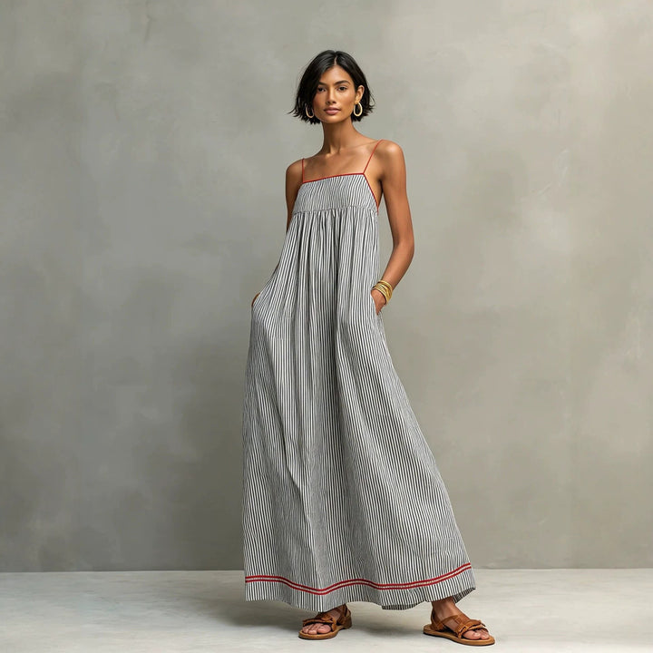 Elegante abito donna maxi senza spalline, vita alta che valorizza la figura, perfetto per le serate estive.