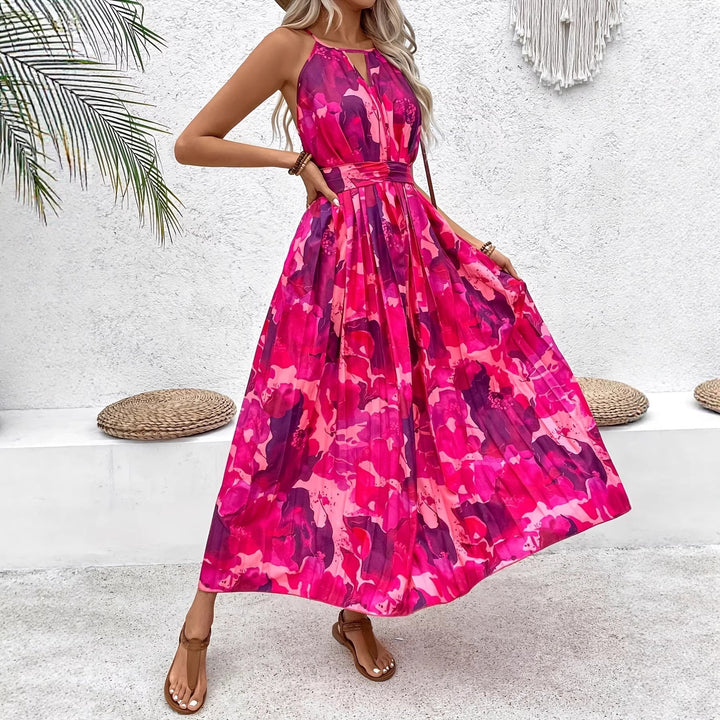 Abito midi donna elegante a fiori, senza maniche, con vita plissettata. Perfetto per l'estate e eventi.