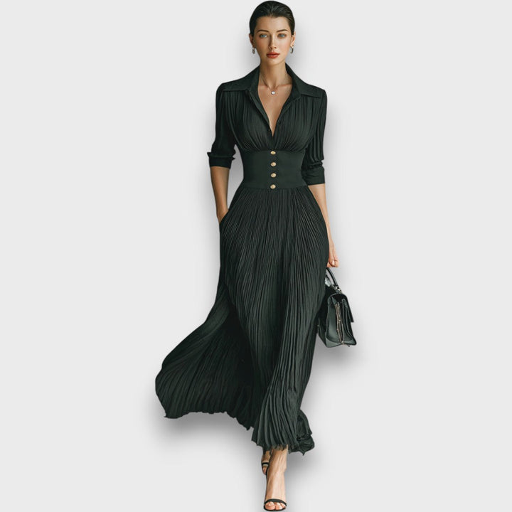 Abito lungo maxi donna nero elegante, con colletto revers e gonna plissettata per un look formale chic.