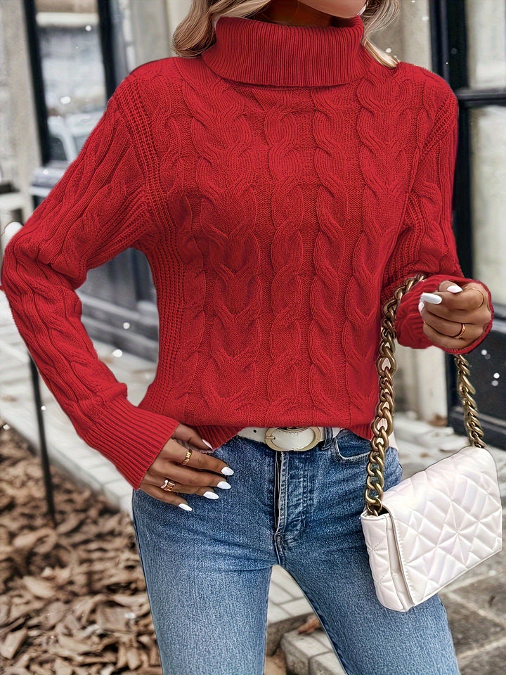 Maglione da donna comodo a trecce, collo alto avvolgente. Il tuo alleato contro il freddo.