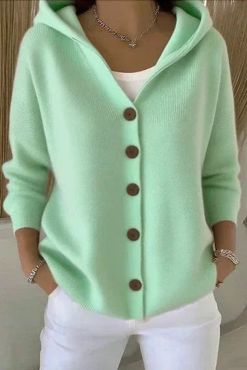 Cardigan donna con cappuccio, bottoni frontali e stile elegante. Maglione versatile e ampio per comfort.