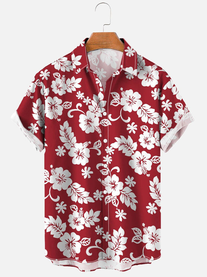 Camicia uomo floreale versatile, maniche corte, stampa casual/elegante, perfetta per ogni occasione estiva.