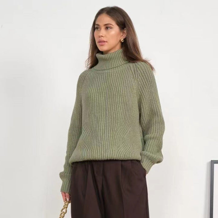 Maglione donna collo alto, maglia spessa e design confortevole, perfetto per un look casual moda autunno inverno.