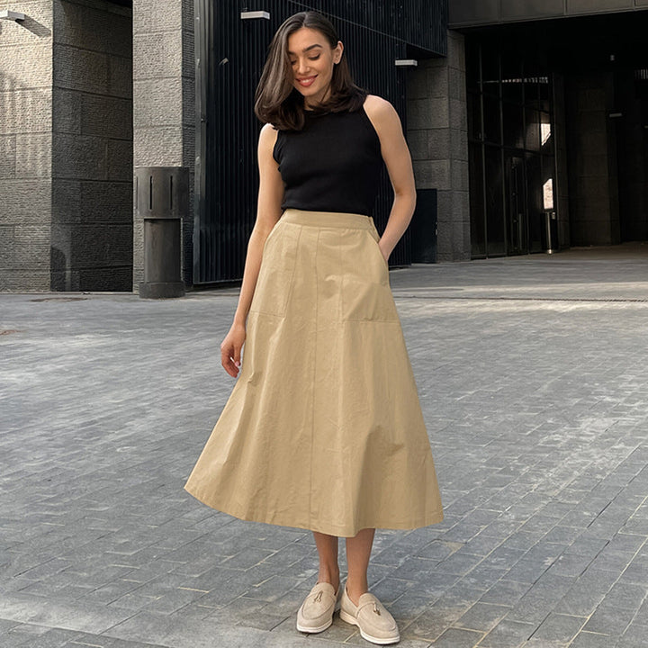 Gonna elegante donna a vita alta, lunga e con tasche. Perfetta per abbigliamento primaverile e autunnale.