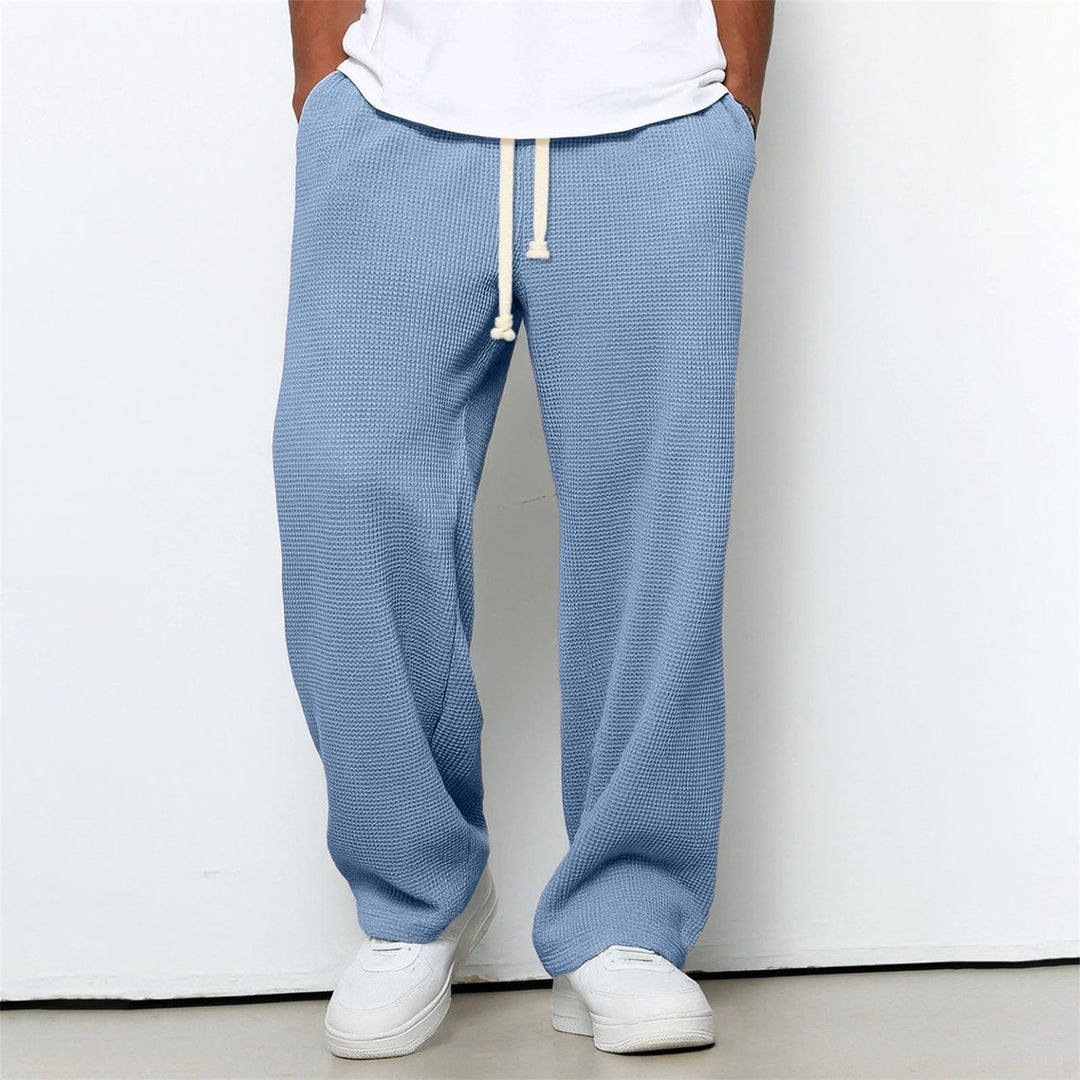 Pantaloni da uomo casual con gamba dritta. Stile moderno e sportivo per comfort e libertà di movimento.