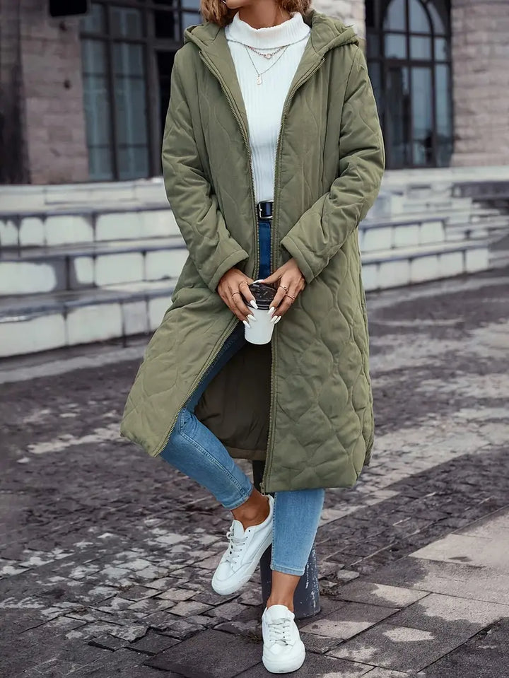Giacca invernale imbottita da donna verde, calda ed elegante, perfetta per affrontare il freddo con stile.