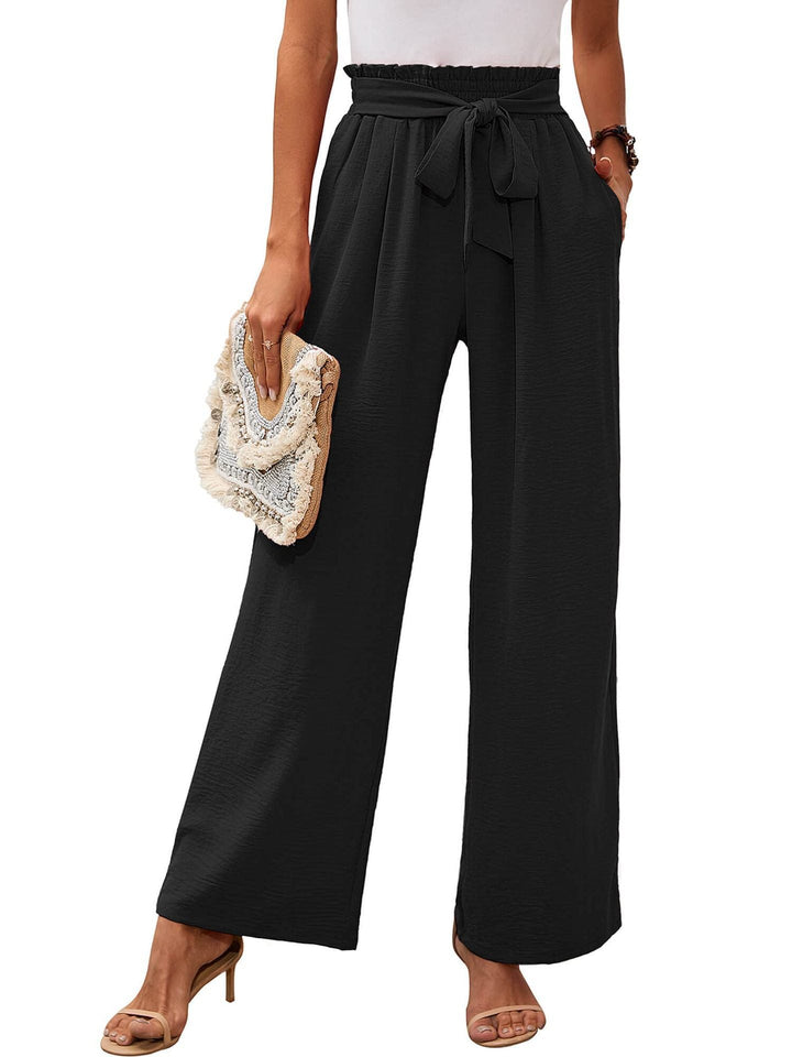 Pantaloni donna vita alta con nodo, gamba ampia. Trendy e versatili per moda primavera estate.