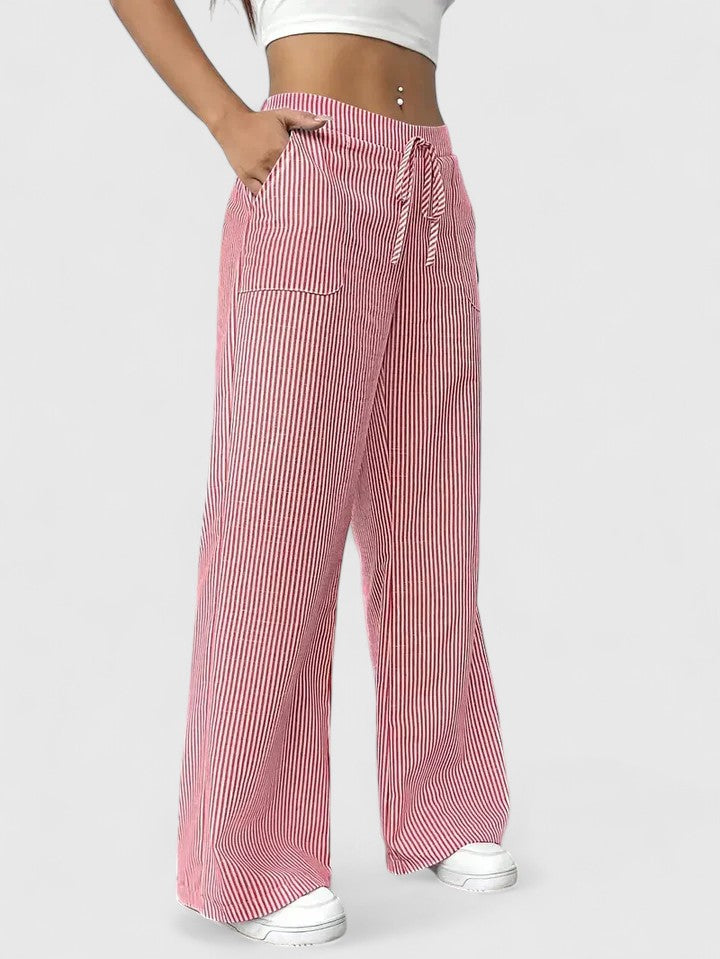 Pantaloni donna eleganti gamba larga, vita alta con laccio. Perfetti per look estivi casual o chic.