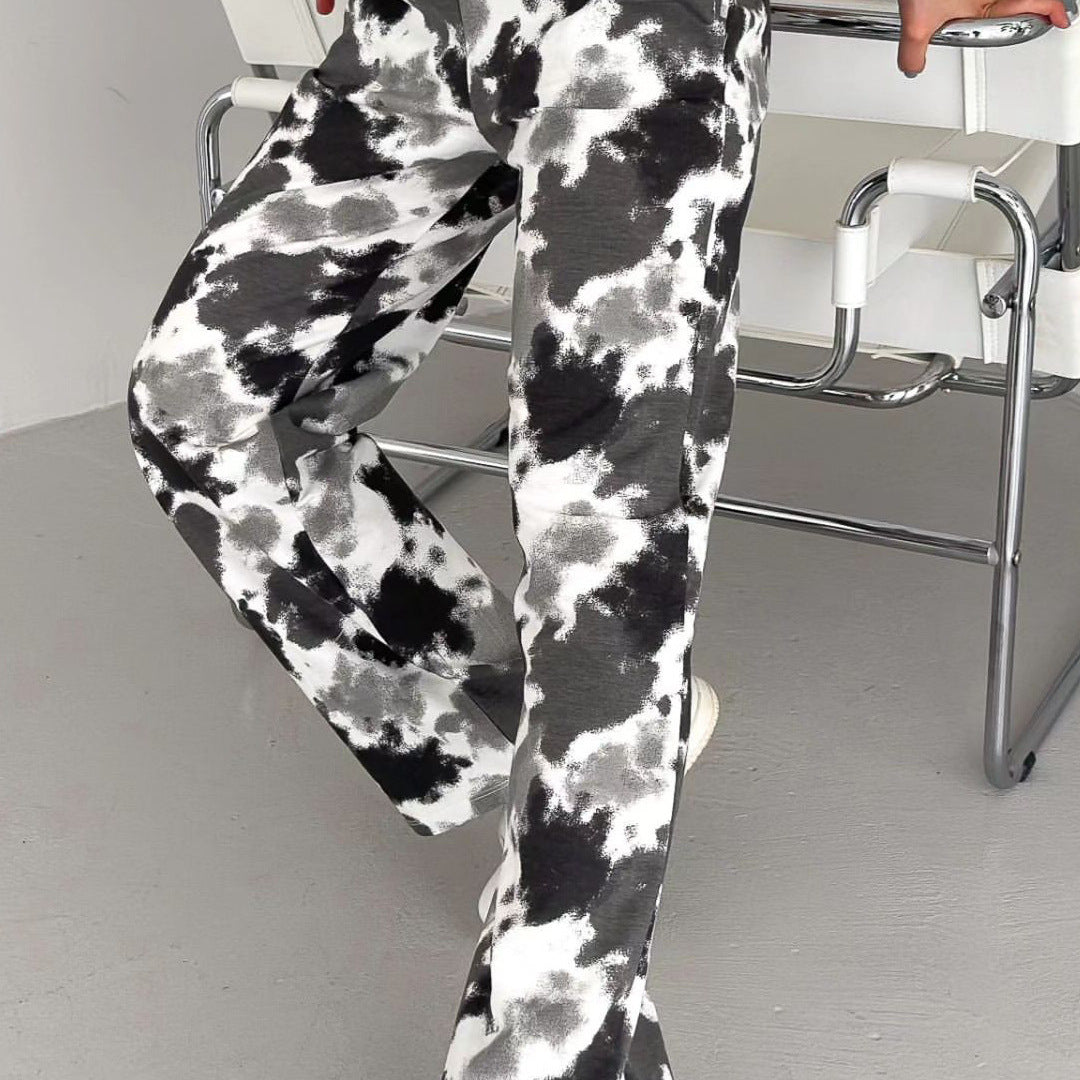 Pantaloni donna con vita elastica per massimo comfort, taglio a gamba dritta e vestibilità ampia.