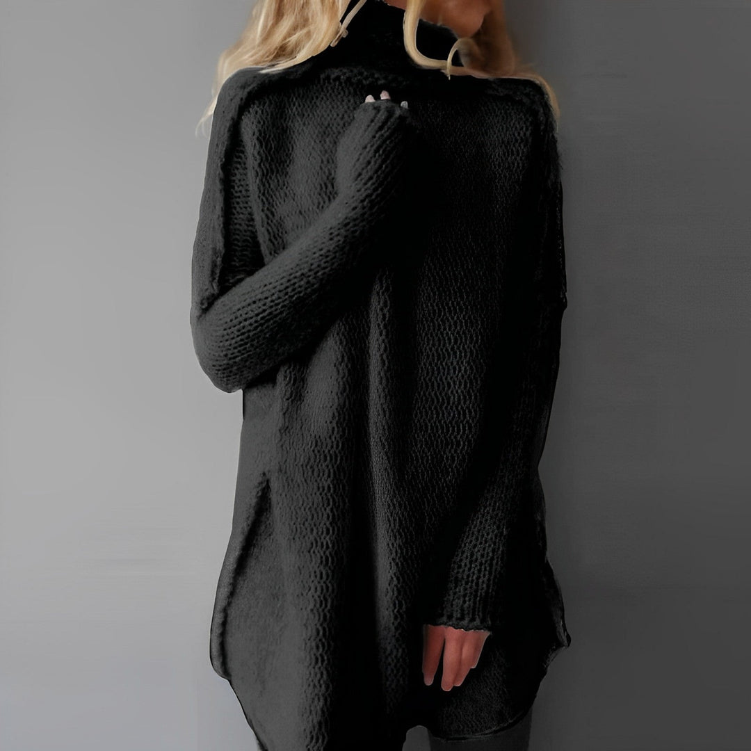 Maglione donna oversize a collo alto, comodo e versatile per outfit quotidiani. Perfetto stile elegante e casual.