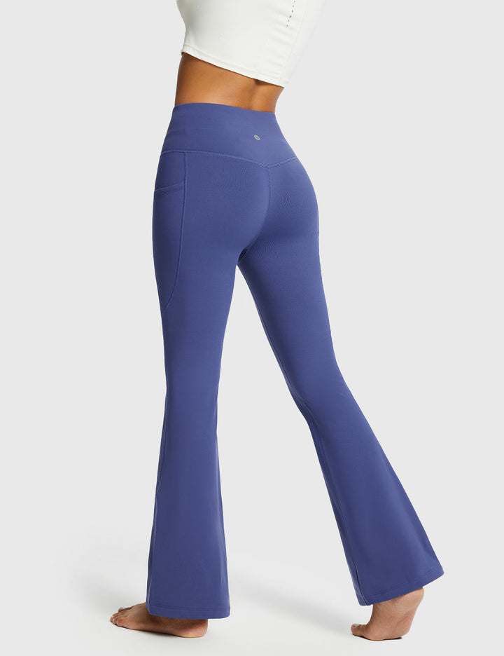 Pantaloni donna invernali, vita alta, svasati, caldi e con tasche, per sport o casual.