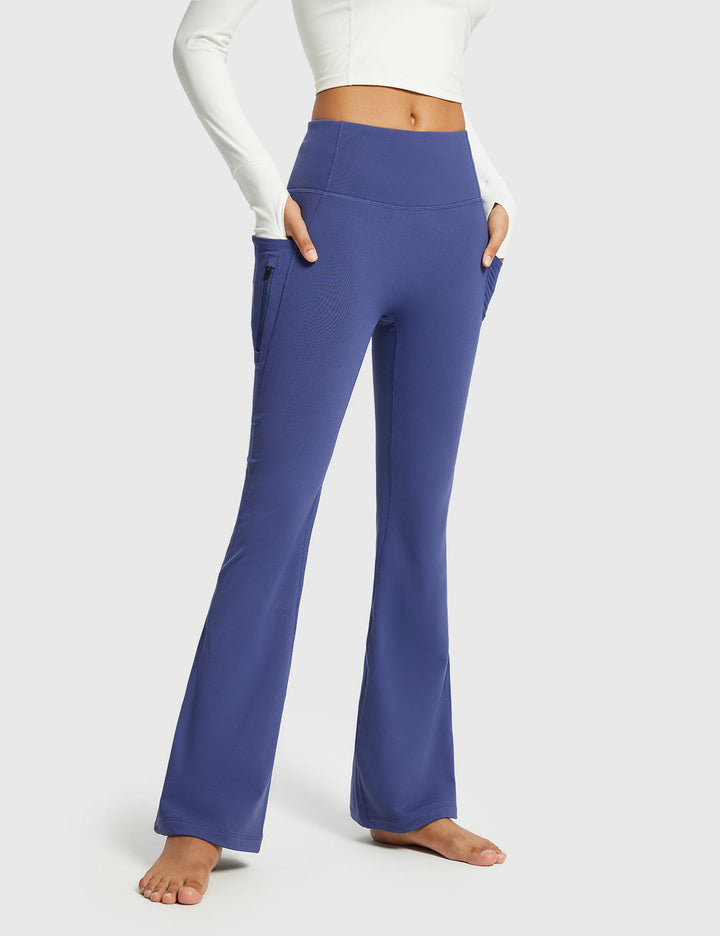 Pantaloni sportivi invernali donna, vita alta, svasati, termici, con tasche per comfort.