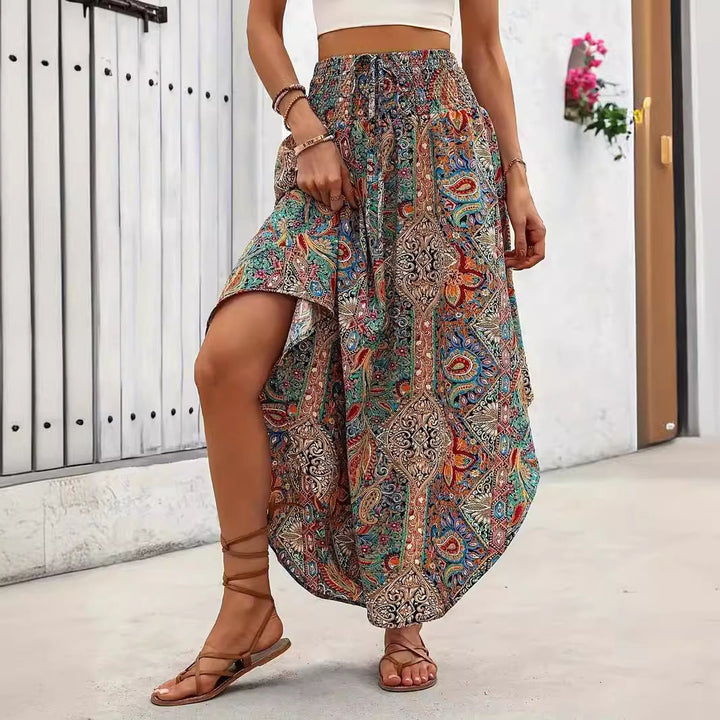 Gonna donna a linea A stampata con fantasia floreale e lacci in vita, perfetta per moda primavera autunno.