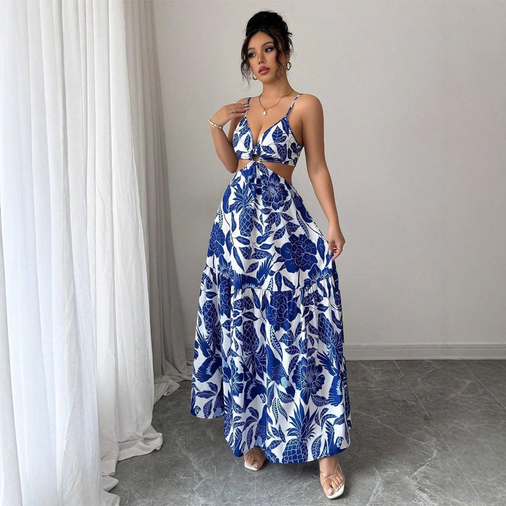 Elegante abito lungo floreale da donna con scollo all'americana, blu zaffiro, perfetto per la spiaggia estiva.