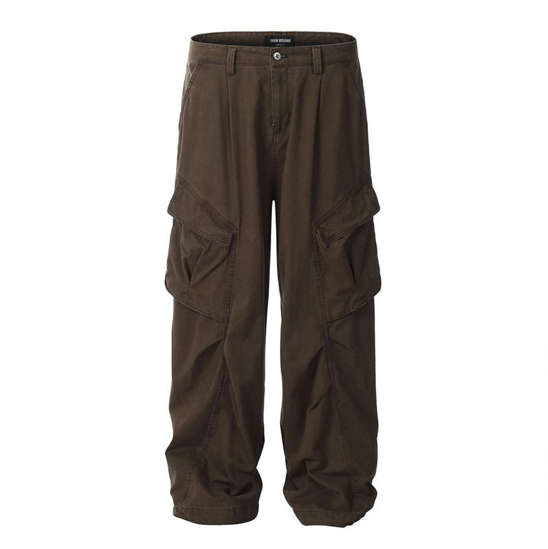 Pantaloni utility uomo streetwear, a gamba larga e vestibilità dritta. Tasche multiple per un look moderno e funzionale.
