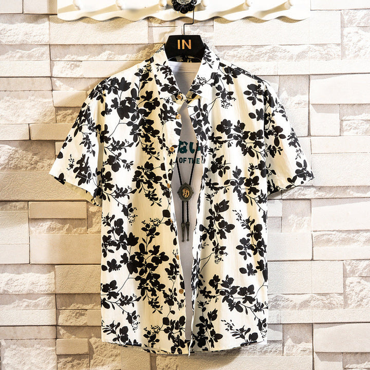Camicia uomo a maniche corte, slim fit, stampa floreale, colletto revers, ideale per un'estate piena di stile.