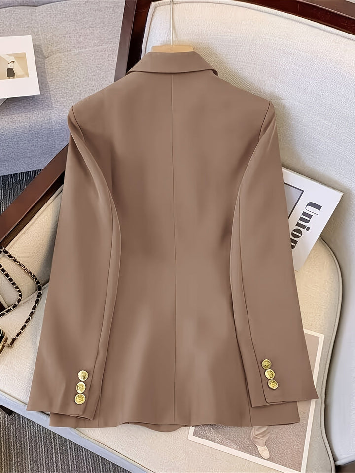 Blazer donna con silhouette slim che valorizza la figura, impreziosito da bottoni dorati.