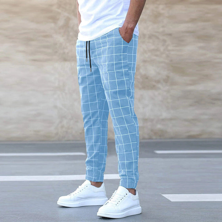 Pantaloni uomo primavera, comodi e leggeri, stile casual con coulisse e gamba dritta, ideali per ogni giorno.