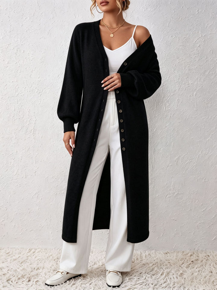 Cardigan lungo da donna con vestibilità morbida, stile elegante per un comfort senza compromessi.