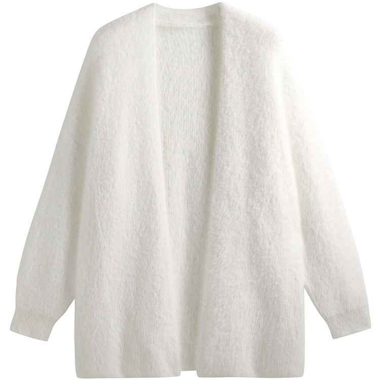Cardigan lungo donna. Abbigliamento comodo e alla moda per autunno inverno. Perfetto per layering.