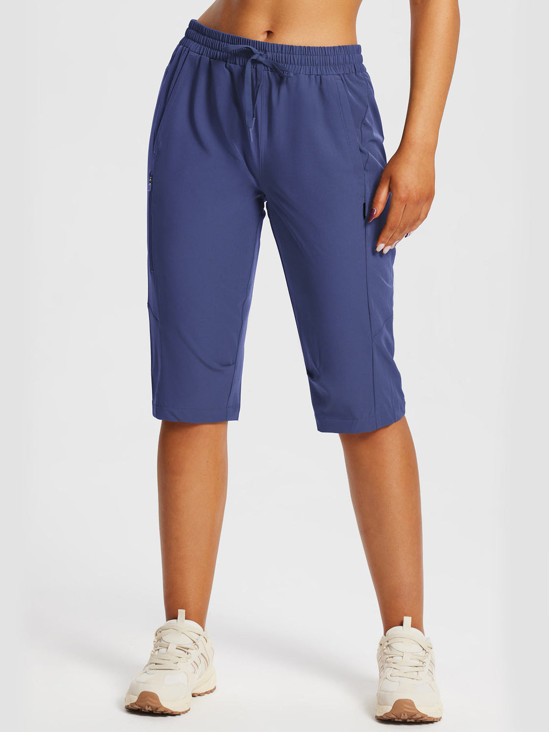 Pantaloncini capri donna per tutte le attività, con tasche spaziose e massima libertà.