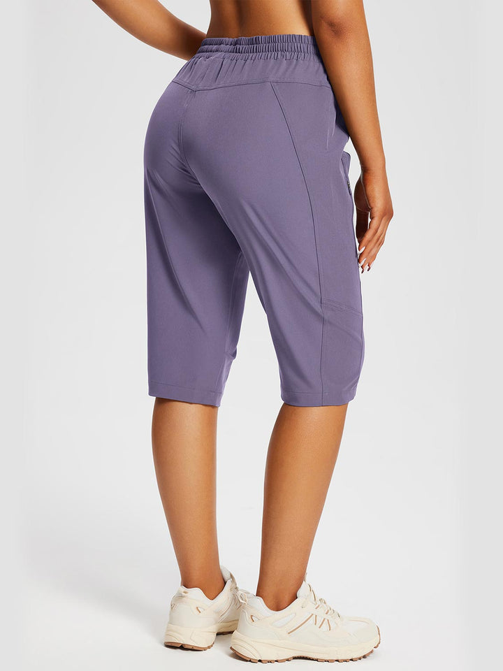 Capri donna per escursioni lunghe, con tasche per telefono e tessuto elasticizzato bidirezionale.