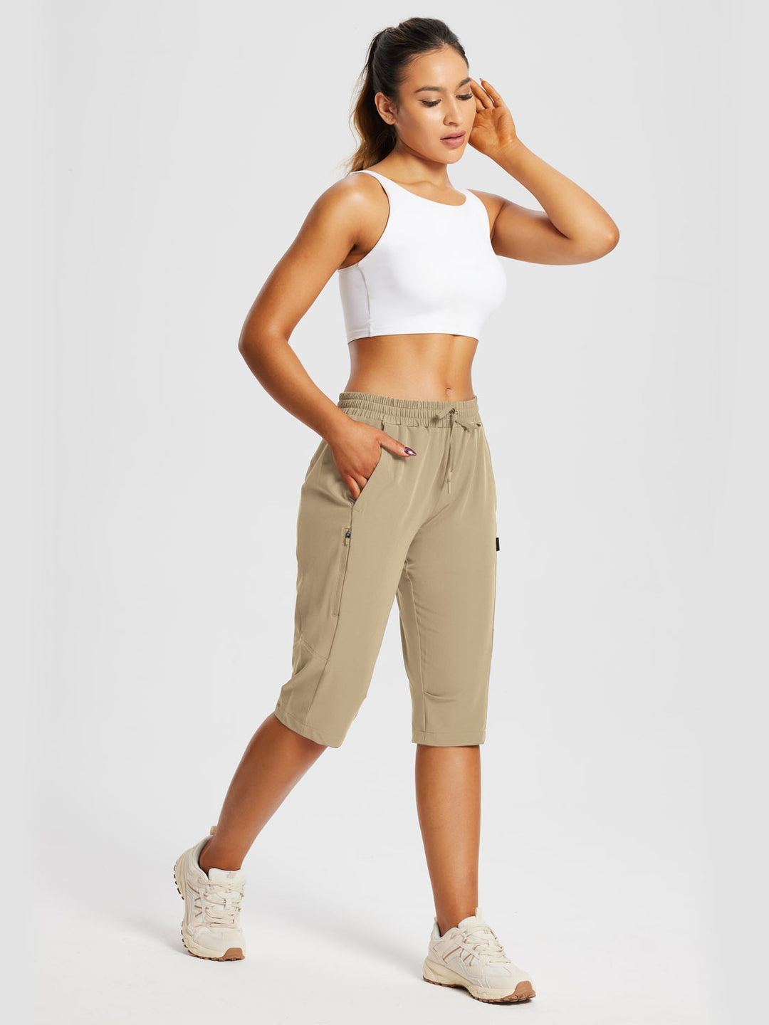 Capri sportivi donna per trekking estivo, con tasche cargo e resistenza agli strappi.