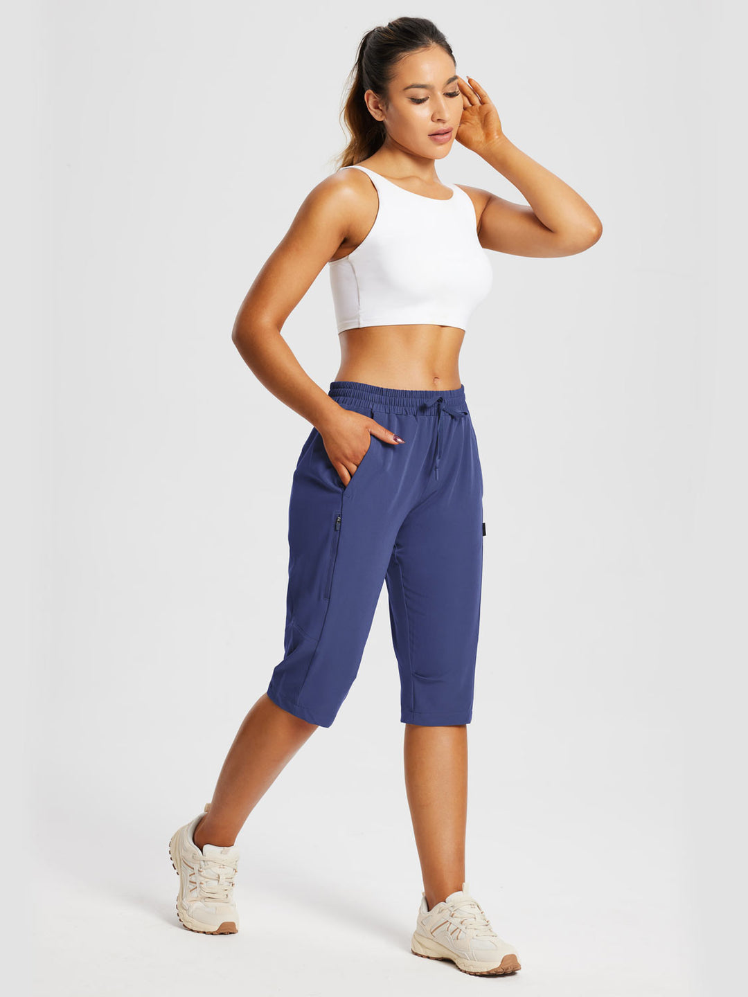 Capri sportivi donna con tasche per ogni avventura, offrendo comfort e praticità.