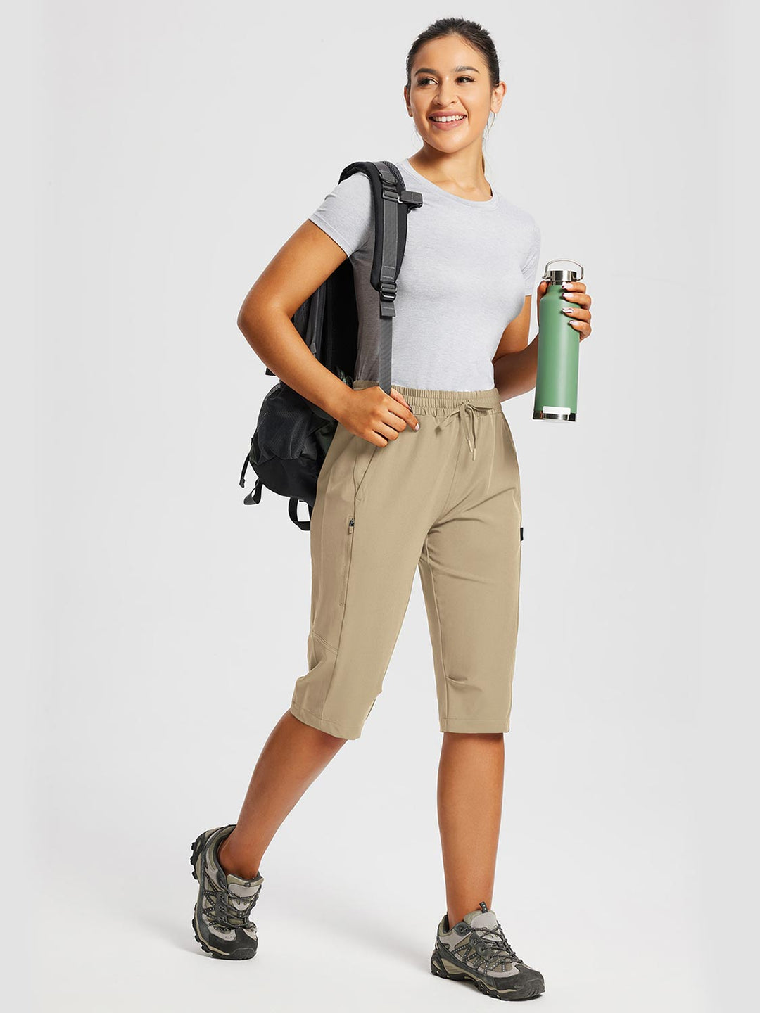 Capri sportivi donna per escursioni veloci, con tasche per gel energetici e barrette.