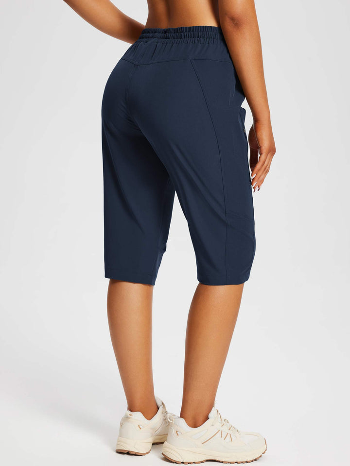 Pantaloncini capri donna ideali per il trekking, con tasche a zip e tessuto traspirante.