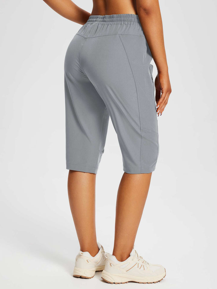 Capri donna per fitness, con tasche adatte a smartphone e tessuti ad asciugatura rapida.
