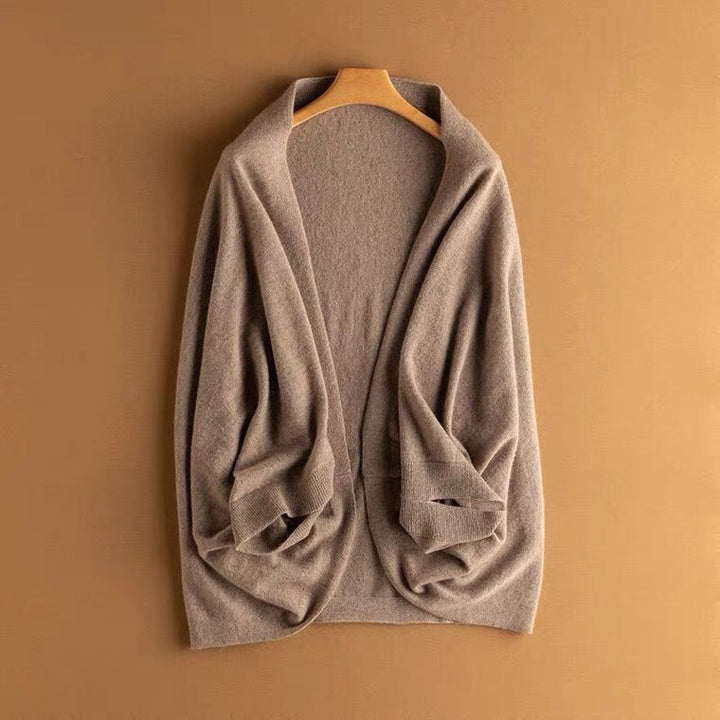 Coprispalle donna avvolgente, scialle versatile per look chic e comodi.