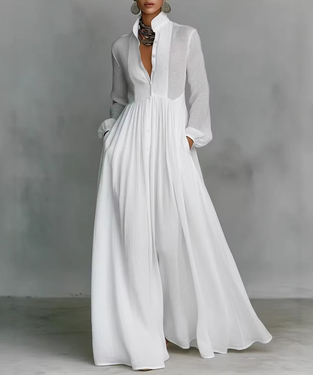 Abito lungo plissettato da donna con manica lunga per cerimonie, look elegante e formale.