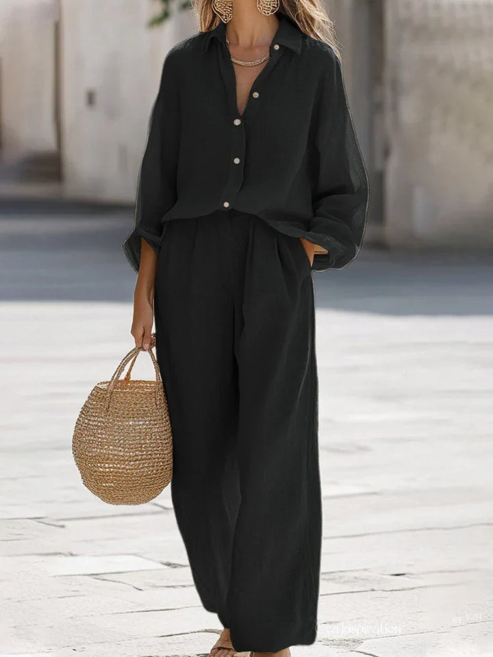 Completo donna chic con camicia e pantaloni ampi, ideale per la moda estiva e outfit casual eleganti.