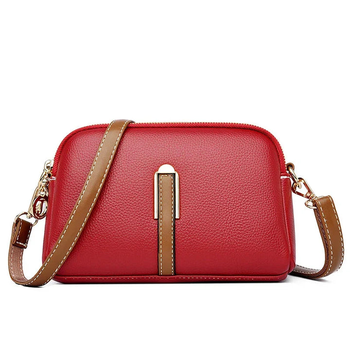 Design moderno ed elegante per questa borsa a tracolla da donna in vera pelle. Borsetta piccola e alla moda.
