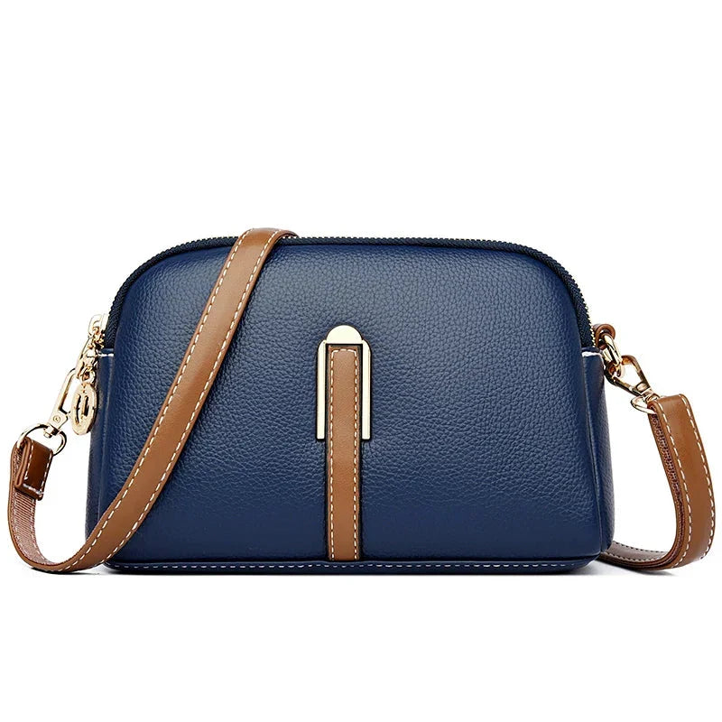 Dettaglio della chiusura su borsa a tracolla elegante da donna in vera pelle. Finitura impeccabile.