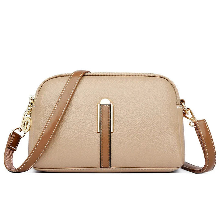 Borsa a tracolla da donna in vera pelle, versatile e chic. Accessorio elegante per look casual o formali.