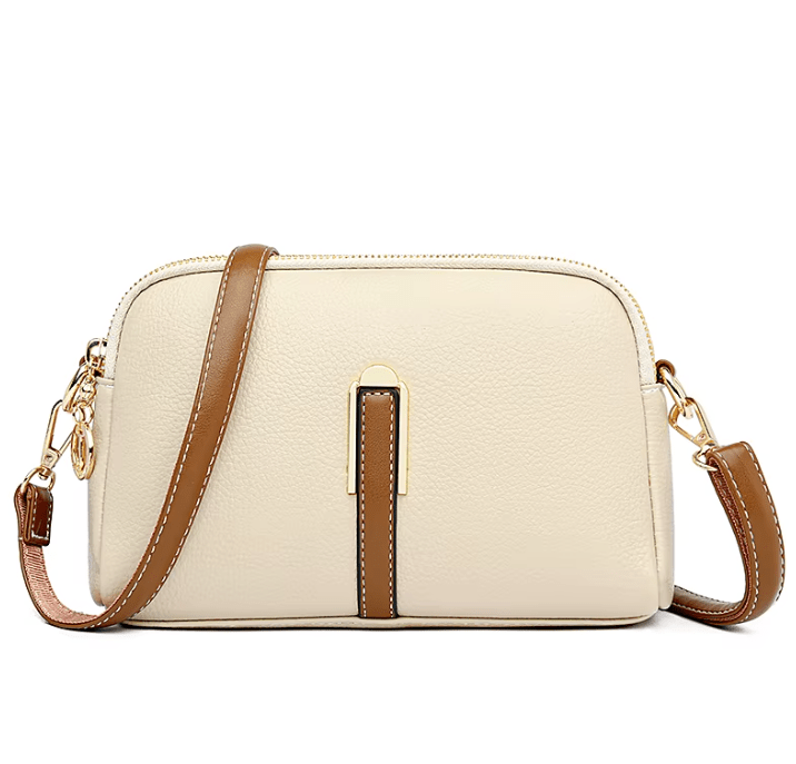 Elegante borsa a tracolla in vera pelle, idea regalo perfetta per la donna che ama lo stile e la qualità.