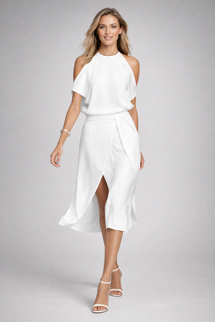 Abito midi donna chic con scollo off-shoulder e orlo irregolare. Perfetto per eventi speciali e look serali raffinati.