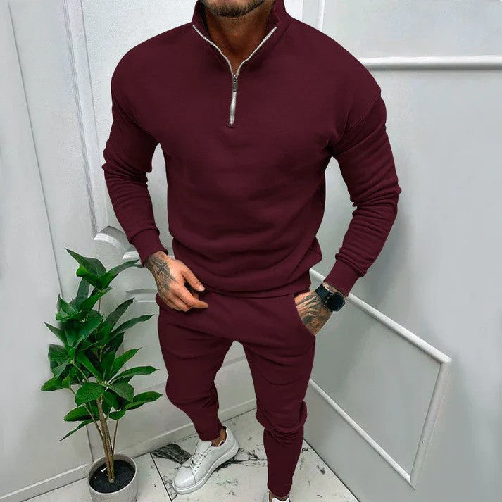 Tuta uomo athleisure versatile, set sportivo con felpa e pantaloni, adatta per allenamento e tempo libero casual.