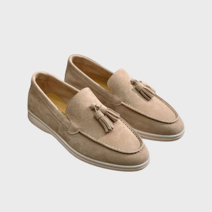 Mocassini uomo eleganti con punta arrotondata. Scarpe classiche senza lacci per comfort quotidiano e stile versatile.