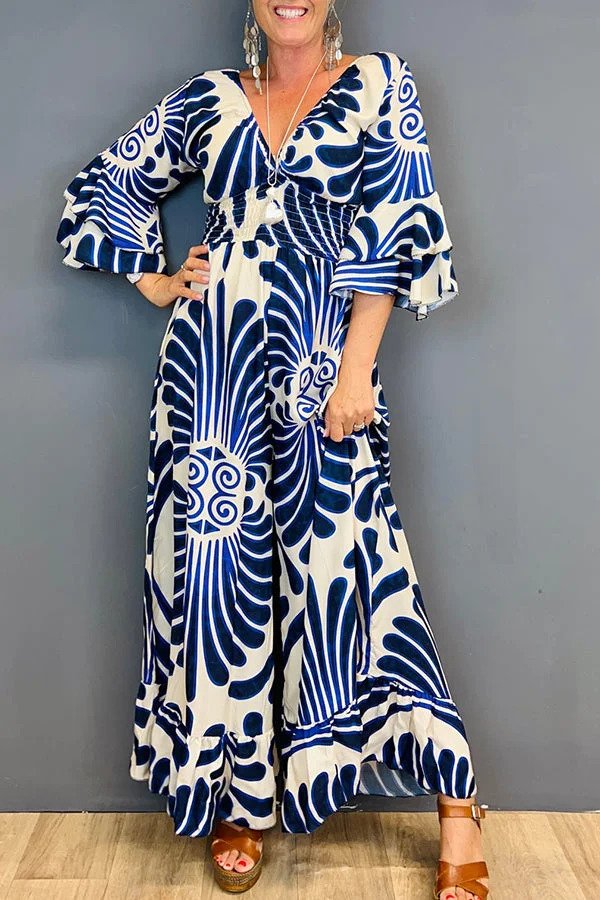 Tuta donna floreale vintage ampia con maniche arricciate. Perfetta per un look casual-chic primaverile ed elegante.