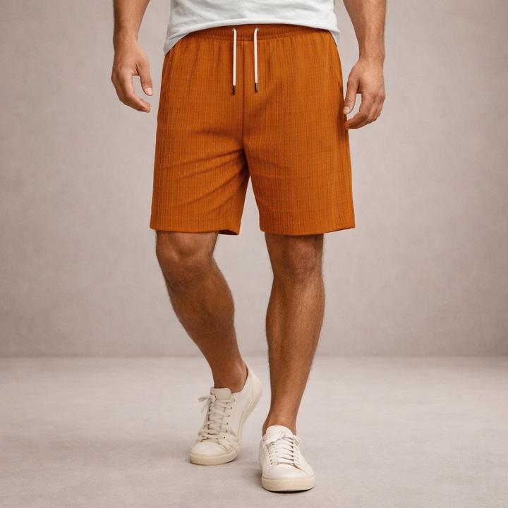 Pantaloncini uomo estivi, freschi e traspiranti, con vita regolabile per una vestibilità ottimale.