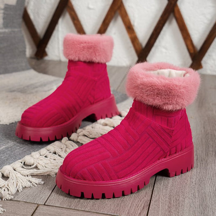 Eleganti stivaletti donna invernali rosa rosso, alla caviglia. Calzature comode e di tendenza per l'inverno.