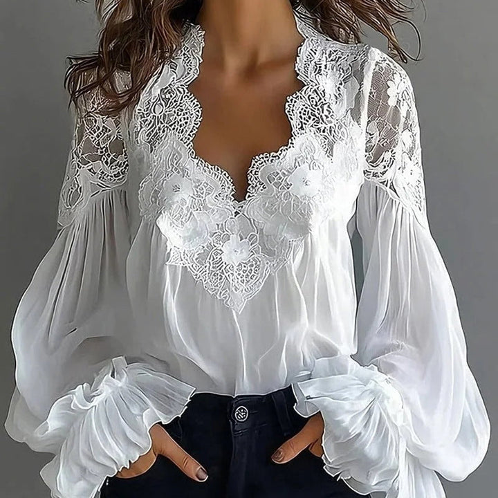 Blouse donna chic maniche lunghe, dettagli in pizzo e volant, ideale per look primaverili ed autunnali. Stile femminile.