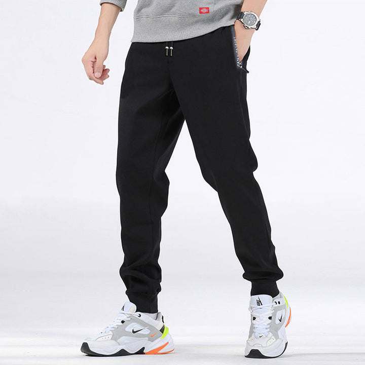 Pantaloni casual uomo neri a gamba dritta, perfetti per l'inverno. Offrono calore, comfort e stile per ogni giorno.