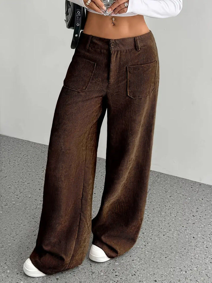 Stile casual ed elegante: pantaloni da donna a coste con vita alta e taglio gamba larga.