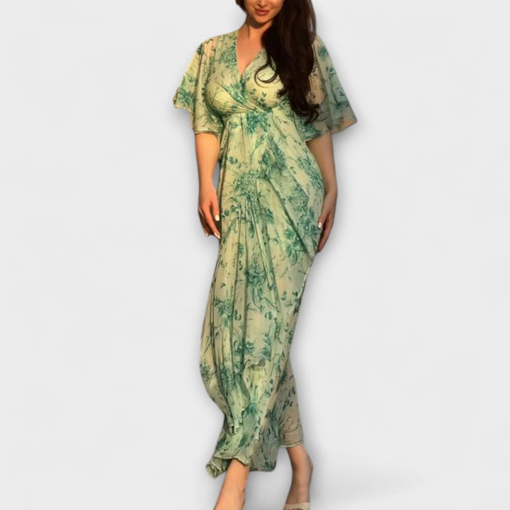 Abito estivo floreale donna con stampa vibrante e scollo a V, per un look fresco e chic.